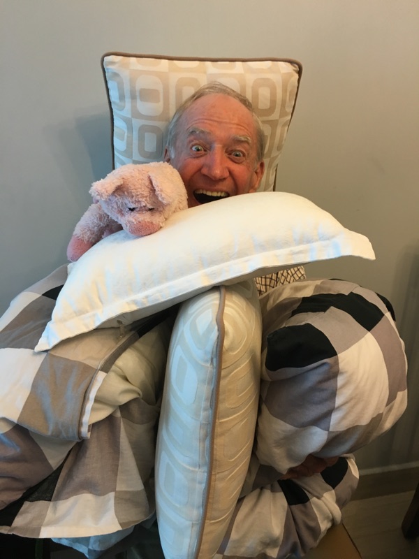 Dad laughing with his toy pig